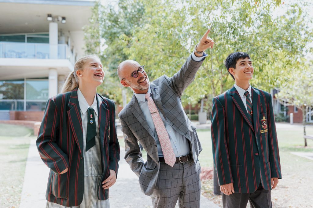 Dr Paul Browning showing St Paul's School students around campus